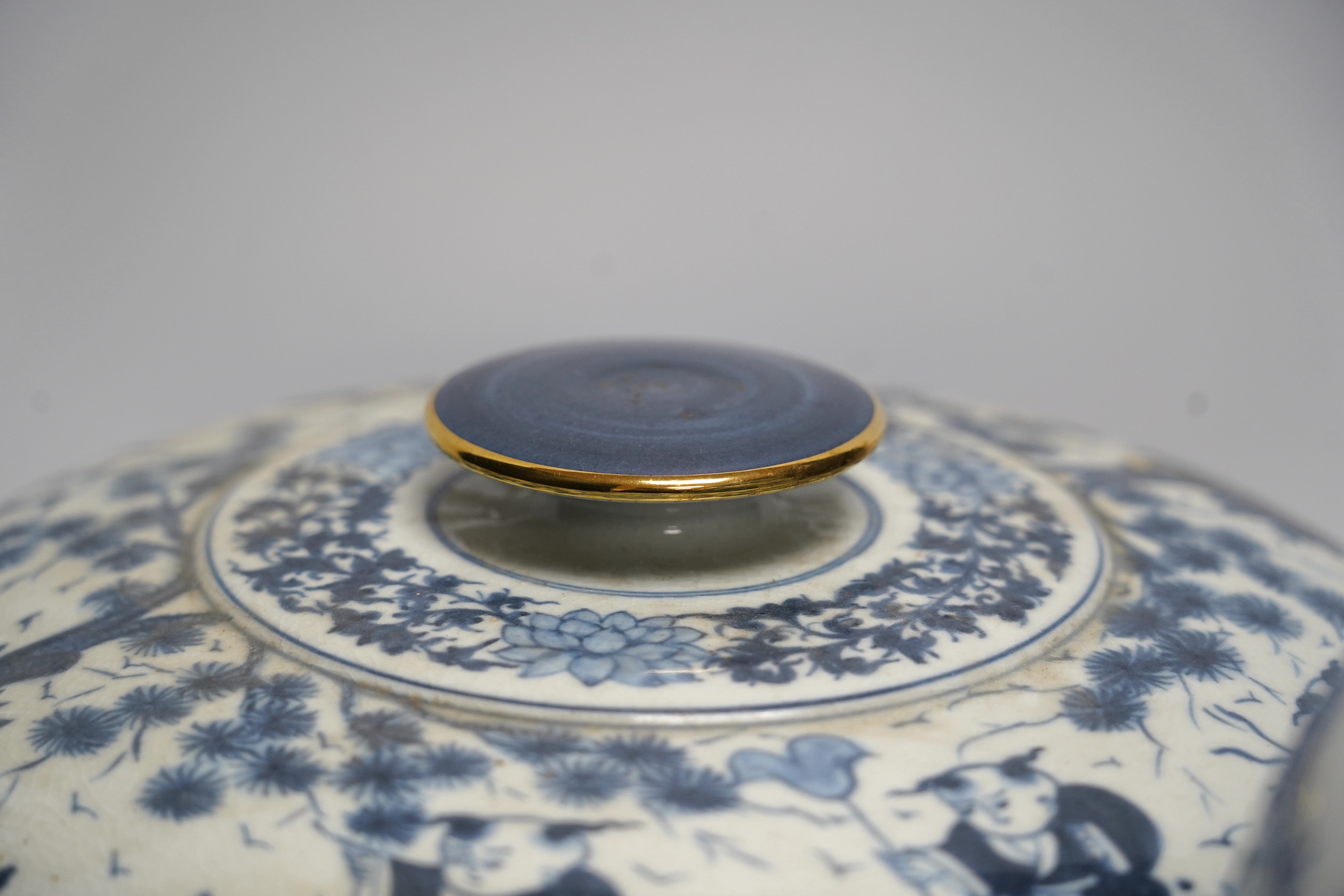 A 20th century Chinese blue and white vase and cover, a large bowl and cover and a smaller bowl and cover, tallest 44cm